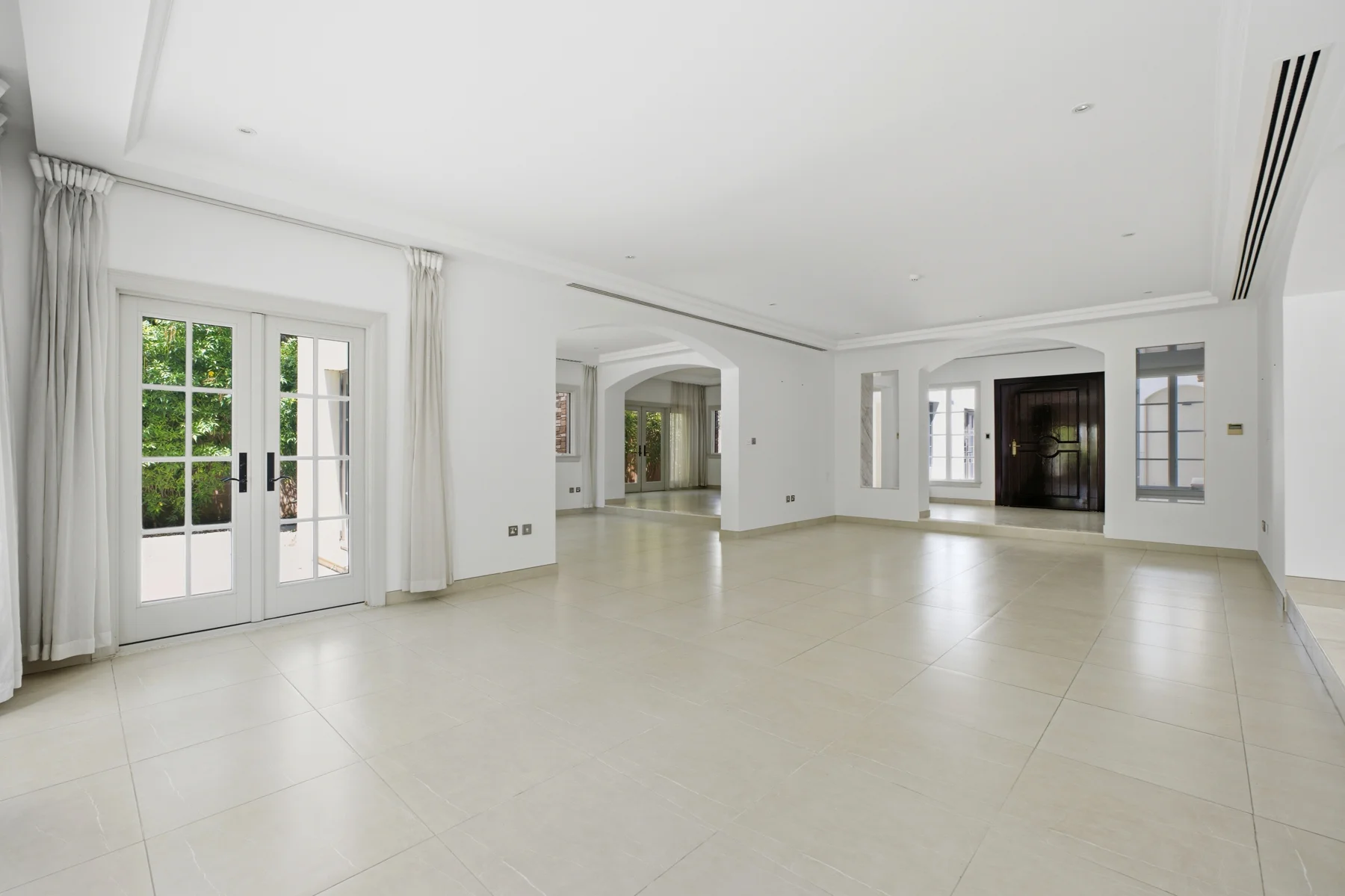 Existing Redwood Avenue living room opening onto the garden