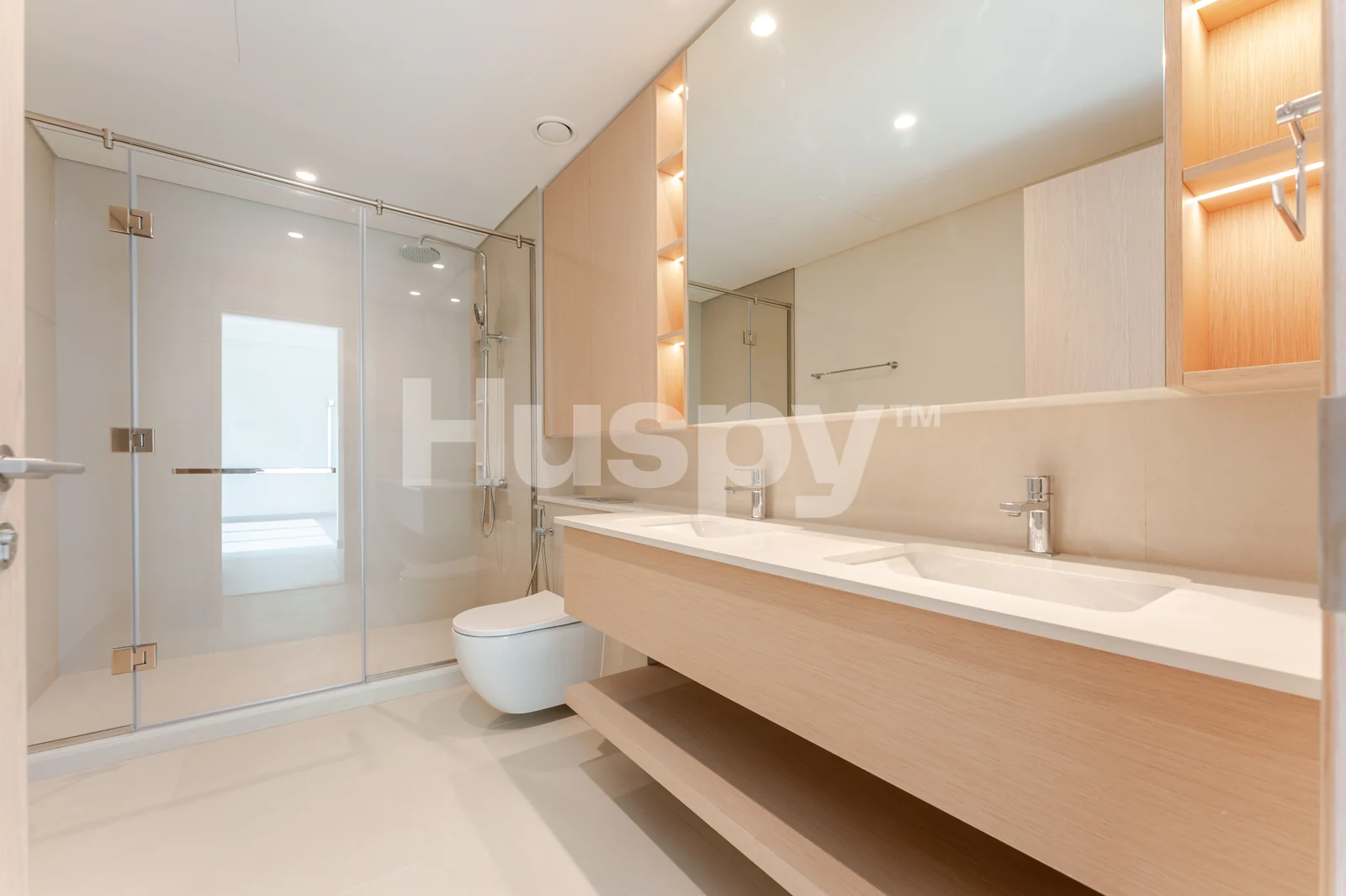 Bathroom with double vanity and walk-in shower