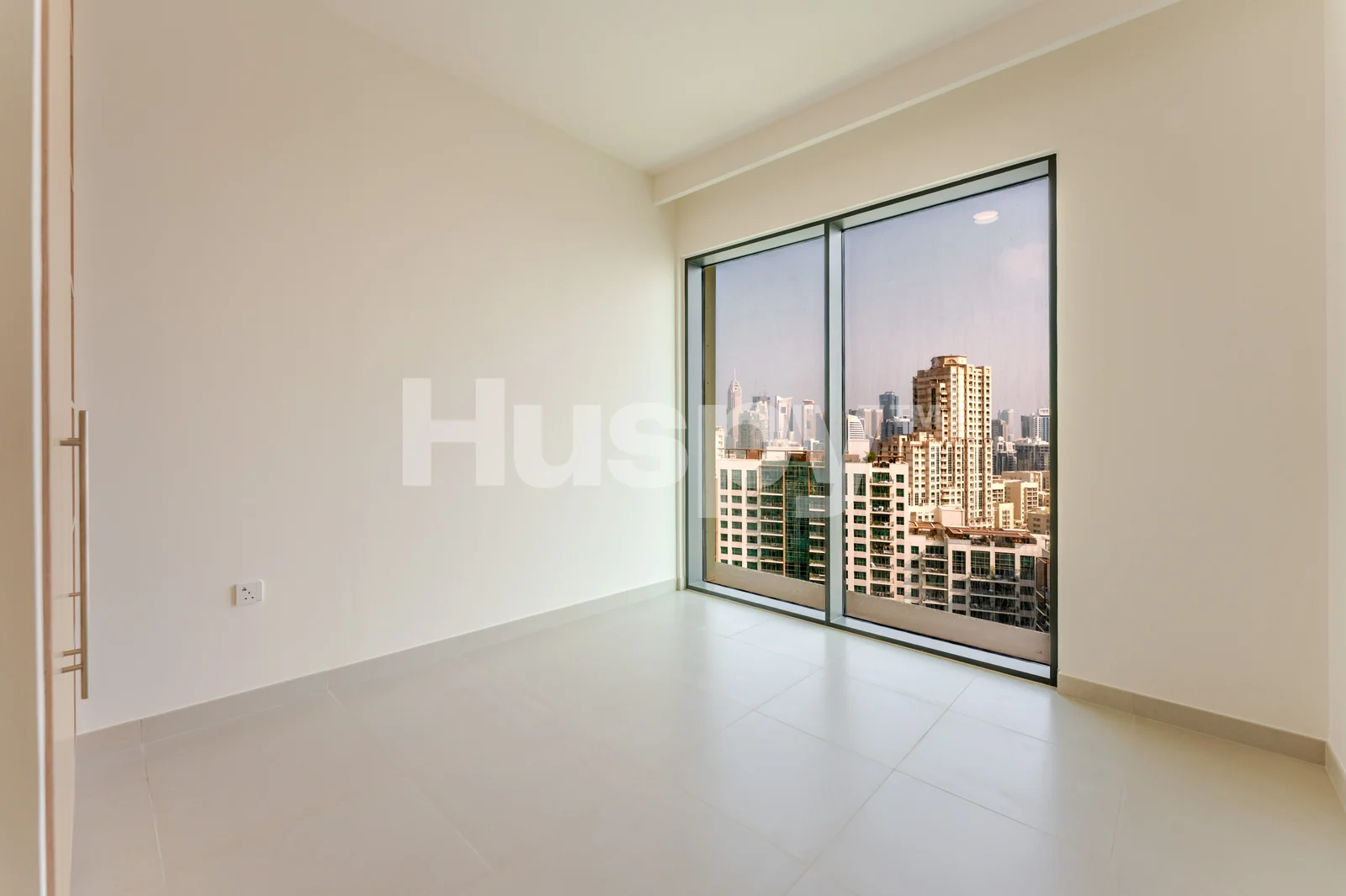 Bedroom with floor-to-ceiling windows