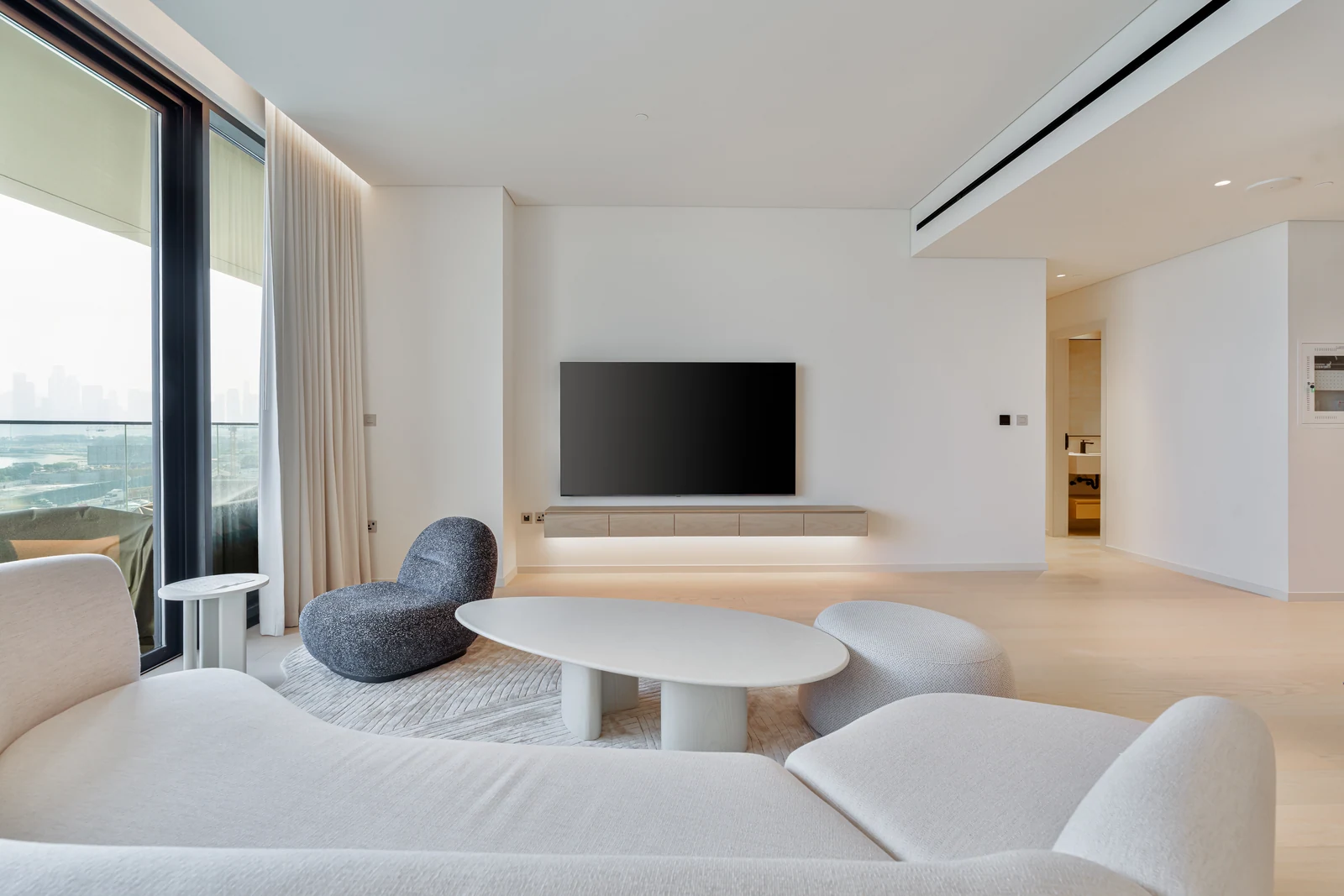 Curved sofa and television in the living room