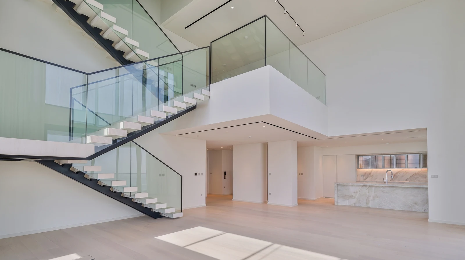 Double-height living room at The Penthouse, Kempinski Residences The Creek
