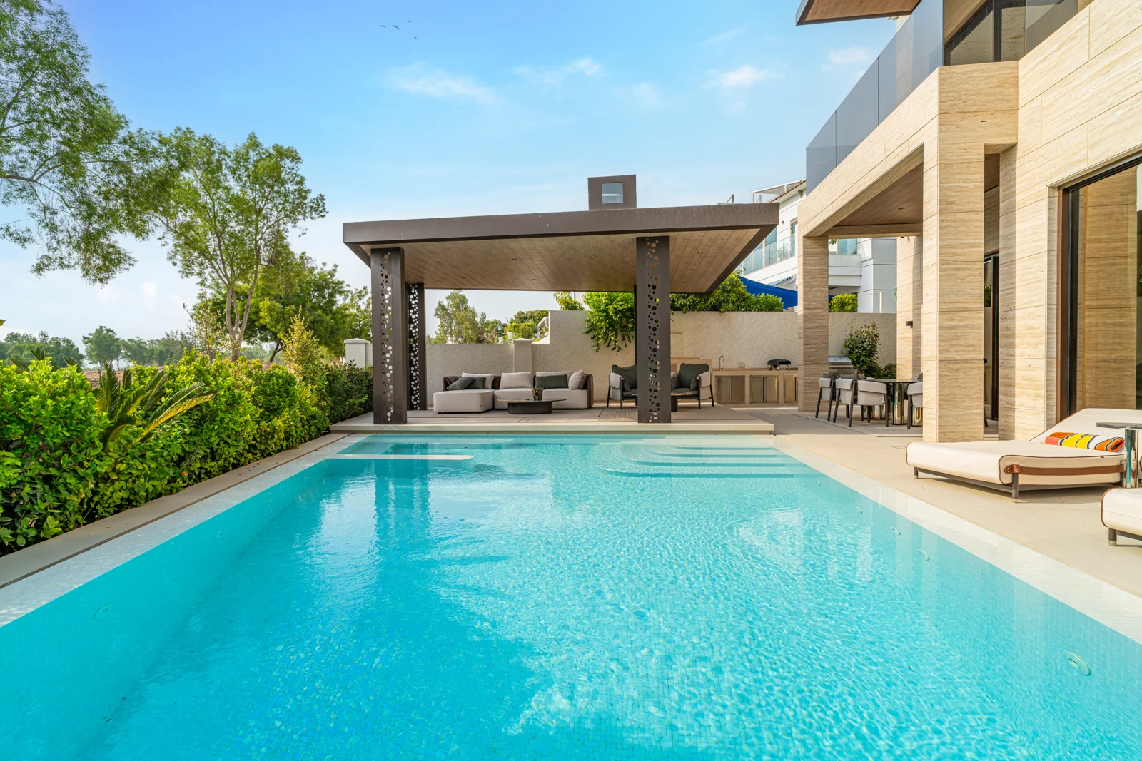 Private swimming pool and shaded terrace